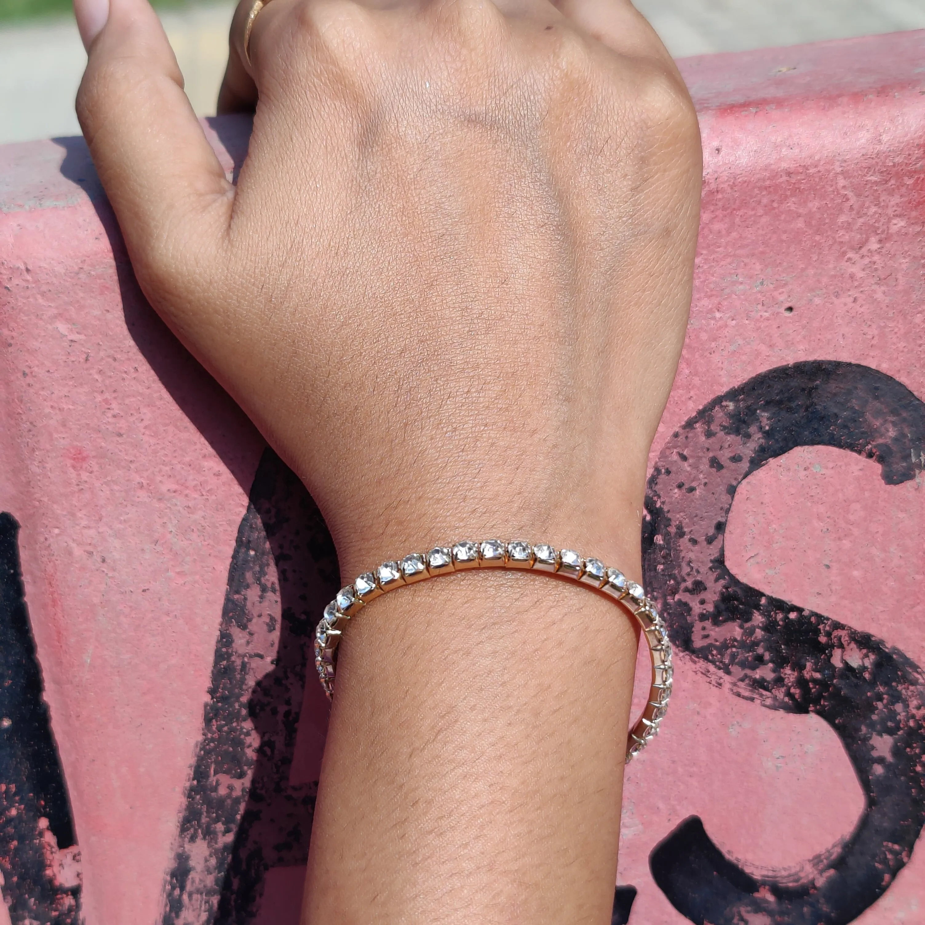 Elegant Gold and Crystal Tennis Bracelet – by Rusty