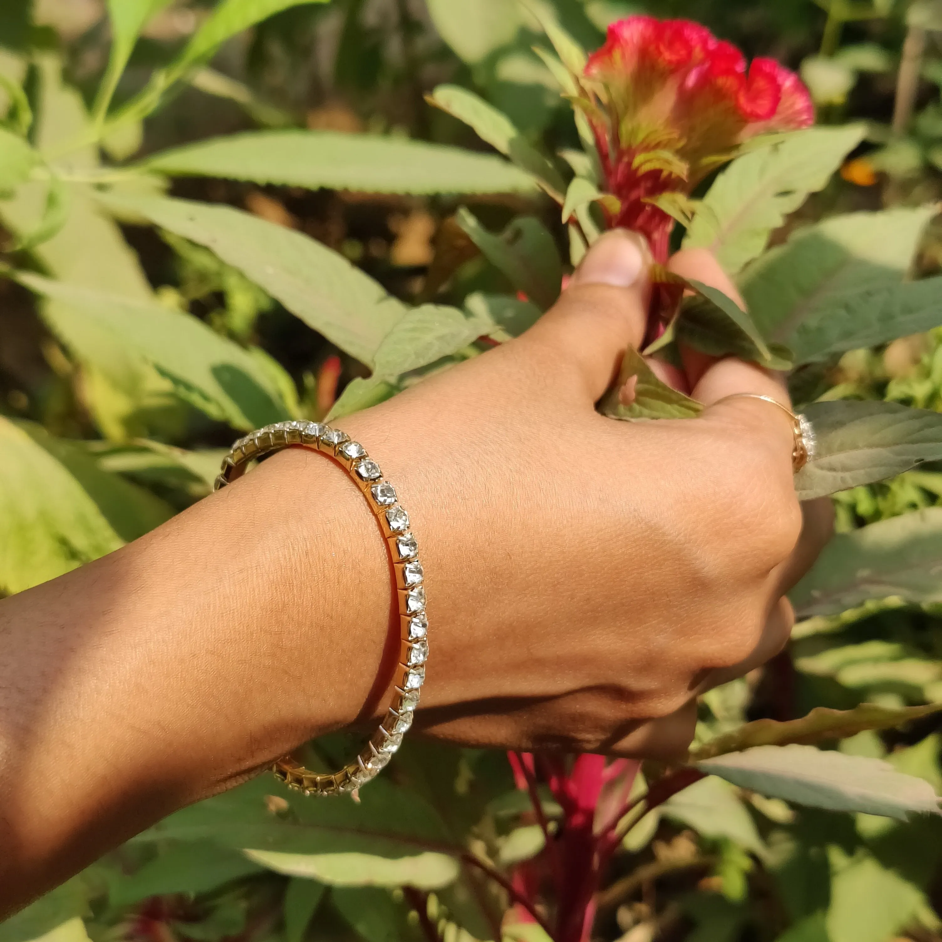 Elegant Gold and Crystal Tennis Bracelet – by Rusty